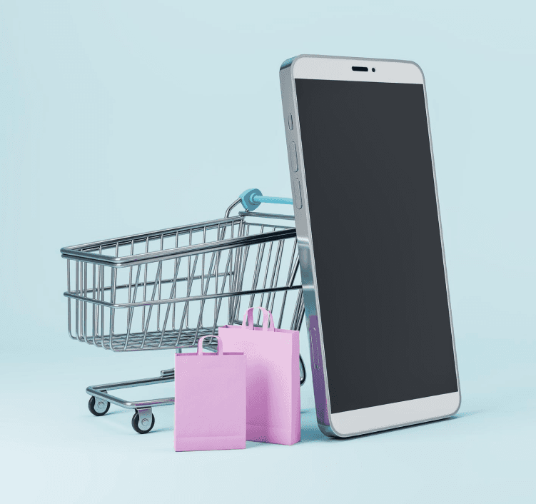 Shopping cart with smartphone and shopping bags